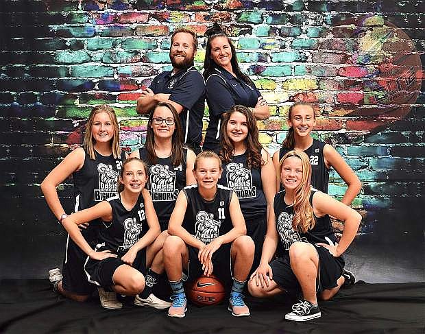 Oasis Academy&#039;s 8th grade team (left to right): Front row: Cassie Edgemon, Jaylee McEwen, Lainee Reid; Middle Row: Maiya Swan, Zoey Ligenfelter, Gabby Hockenberry-Grimes, Ellie Bird; Back Row: Coach Jake Lewis, Coach Loni Faught