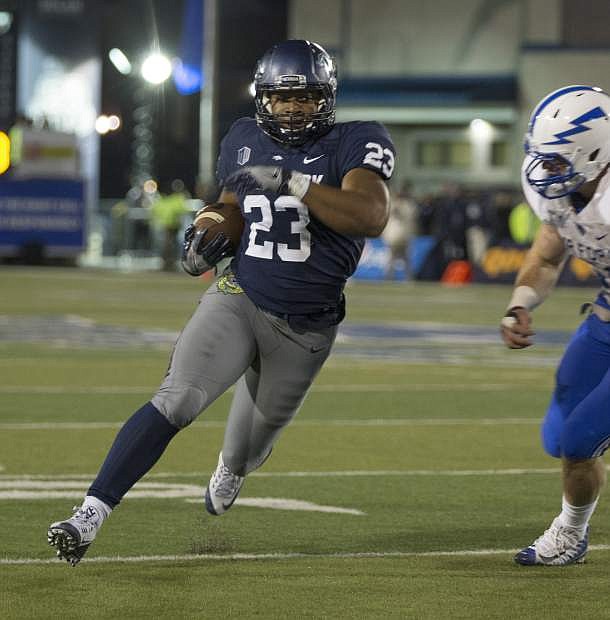 Nevada&#039;s Kelton Moore (23) runs against Air Force in the first half in Reno, Friday, Oct. 20.