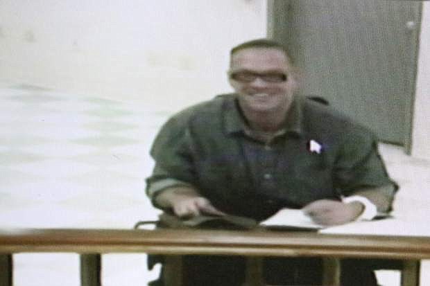 Nevada death row inmate Scott Dozier appears in a Las Vegas court via video on Wednesday.