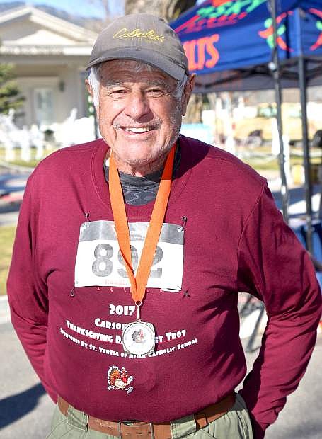 Terry Hogan, 79, is the oldest finisher Thursday at the Turkey Trot finishing tenth in the 60-69 age category.