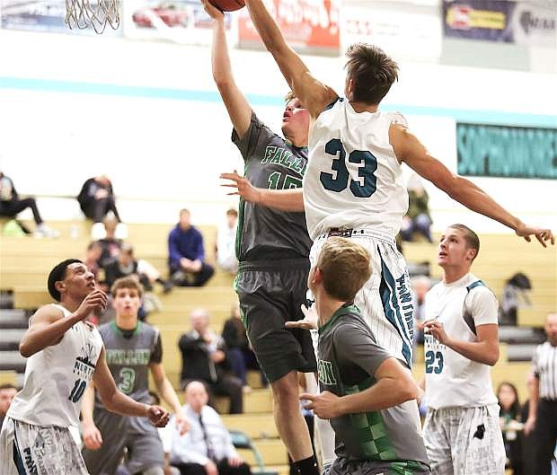 Fallon&#039;s Thomas Steele drives to the basket in the Greenwave&#039;s win over North Valleys.