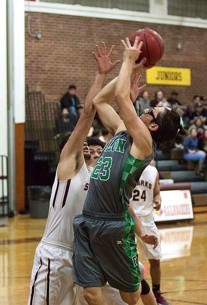 Christian Nemeth leaps for the basket during a greenwave game in Sparks last season.