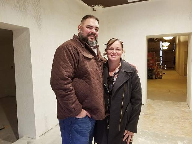 Sean and Kim Saucedo stand inside what will become their new store, Rustically Divine, once all the renovations are complete.