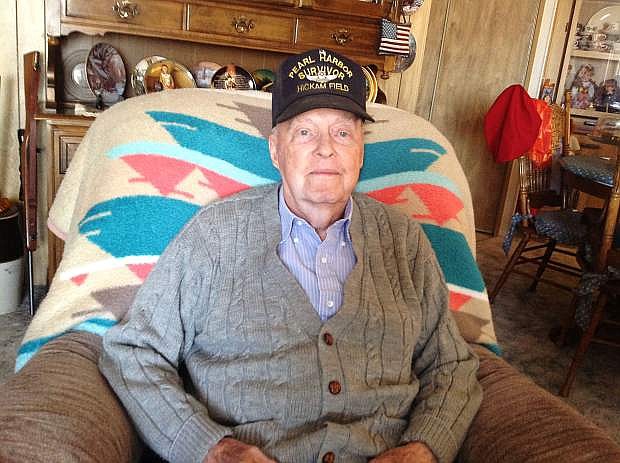 USAF retired Captain Robert &#039;Bob&#039; Lloyd proudly wears his Pearl Harbor Survivor Hickam Field hat as he relaxes at home in Dayton.