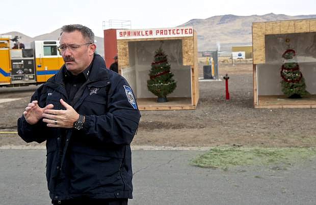 State Fire Marshall Bart Chambers explains the sequence of events Friday morning at Station 52.