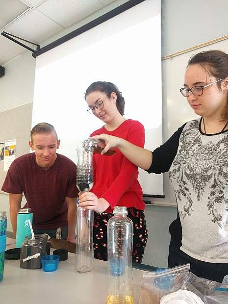 Engineering design students at WNC work on a prototype for a water filter the students built to benefit Puerto Ricans struggling to recover after Hurricane Maria.