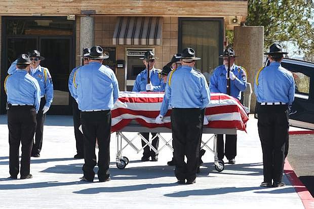 Northern Nevada All Veteran Honor Guard conducts a funeral ceremony at the Northern Nevada Veterans Memorial Cemetery in Fernley.