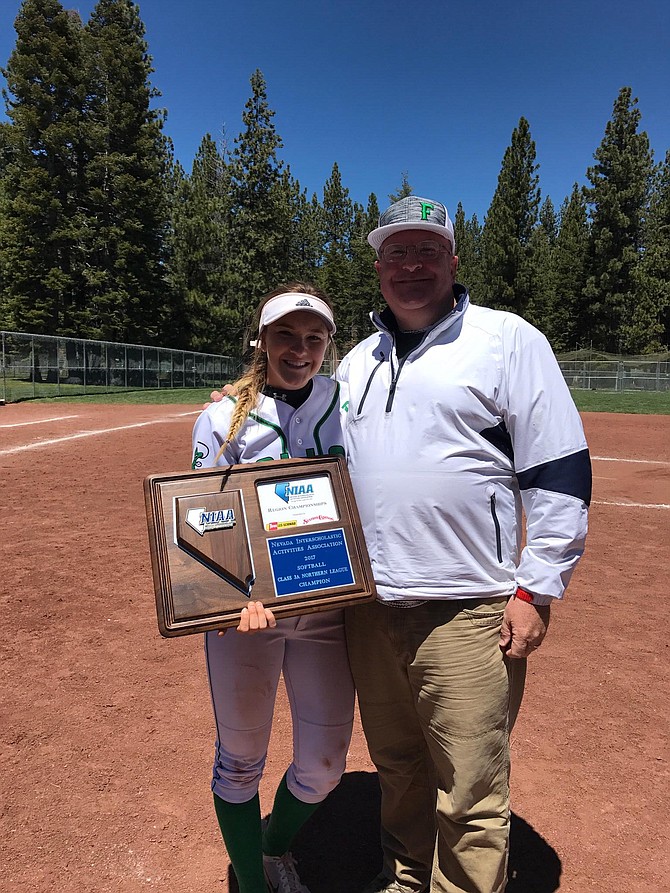 Churchill County Chief Financial Officer Alan Kalt, right, with his daughter, Stacy, after the Greenwave Softball team won Regional Title by defeating Fernley at South Lake Tahoe in May.