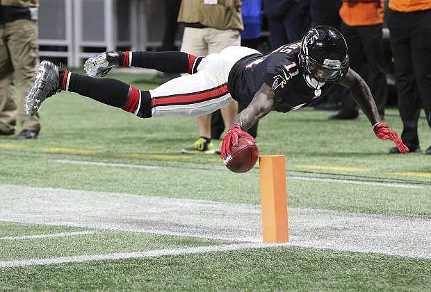 Atlanta Falcons wide receiver Julio Jones reaches over the goal line for a touchdown against the Tampa Bay Buccaneers on Nov. 26.