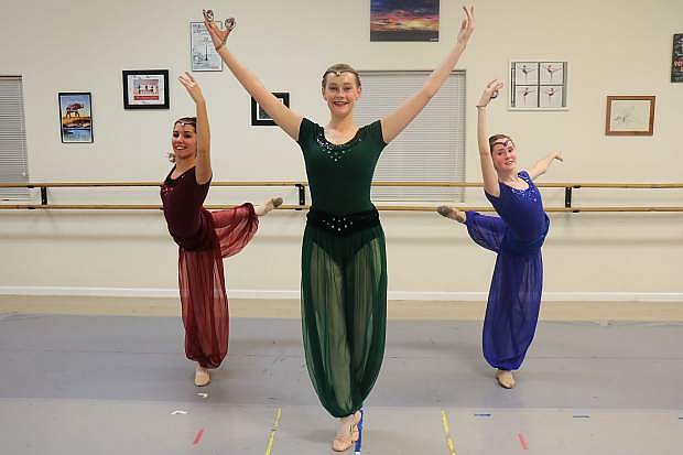 The Nutcracker&#039;s Arabian dancers practice from right, Madison Blea, Maria Whitaker, and Patience Custer.