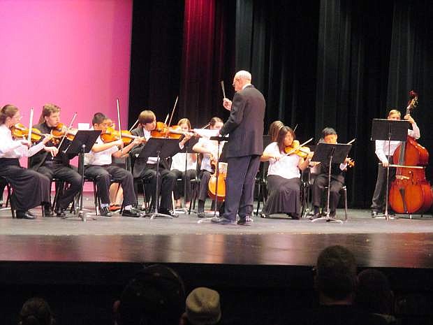 Lou Groffman conducts STRAZZ advanced string ensemble in concert last year.