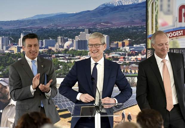 Apple CEO Tim Cook is introduced during ceremony celebrating a new Apple warehouse on Wednesday, Jan. 17, 2018, in Reno, Nev. (Andy Barron/The Reno Gazette-Journal via AP)