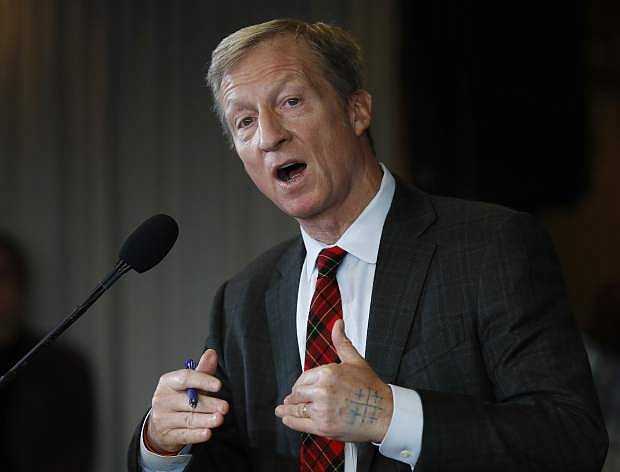 Billionaire environmental activist Tom Steyer speaks during a news conference in Washington, Monday, Jan. 8, 2018. Steyer announced Monday he will spend $30 million to get young voters to the polls in this year&#039;s midterm elections. (AP Photo/Carolyn Kaster)