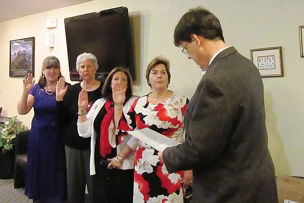 The Honorable Judge Leon Aberasturi administered the Oath of Office to incoming officers at the Fernley Republican Women annual Christmas/Installation Dinner on Dec. 16 at The Golf Club at Fernley. The officers for 2018 are Lorrie Olson, President; MJ Dodson, 1st Vice President; Joy Connelly, 2nd Vice President; Peggy Gray, Secretary; and Kim Bussey-Paxton, Treasurer. Pictured from left: Kim Bussey-Paxton, Peggy Gray, MJ Dodson, Lorrie Olson and Judge Leon Aberasturi. For information, email Lorrie Olson at llflolson3@yahoo.com, or go to fernleyrepublicanwomen.com.