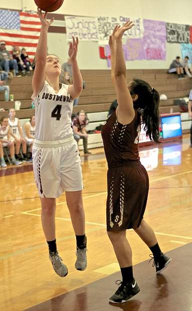 Cassie Dickenson puts up a shot Saturday afternoon against Sparks at Dayton High.