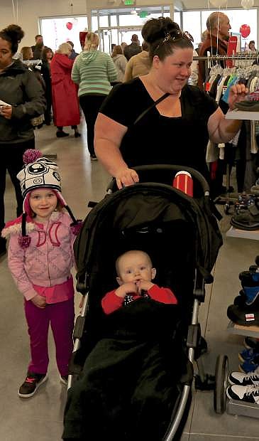 April White of Carson City shops with her kids Aubrey, 3, and Levi, 11 mos. Thursday morning at the new Salvation Army Family Store.