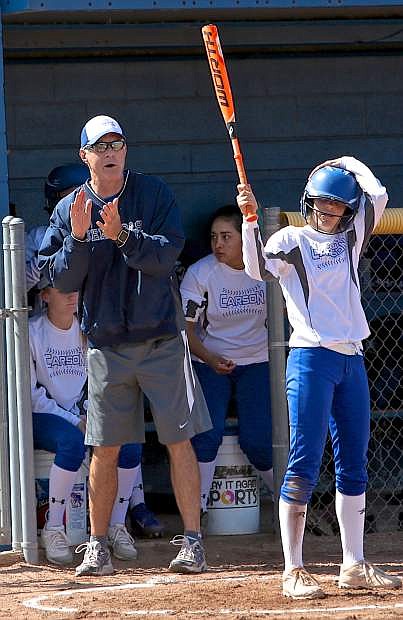 Coach Shane Quilling encourages his players Friday during the first game of a double-header with Galena.