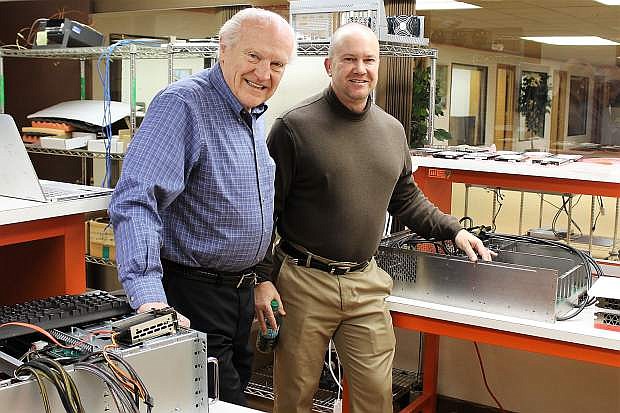 Cubix owner Al Fiegehen (left) and son Eric are creating the next generation of high-speed computers used in artificial intelligence.