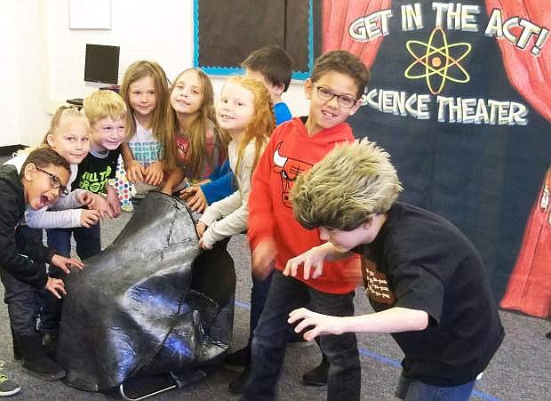 Second graders from E.C. Best School in Fallon act out scenes while learning science concepts at a science theater program held in January.