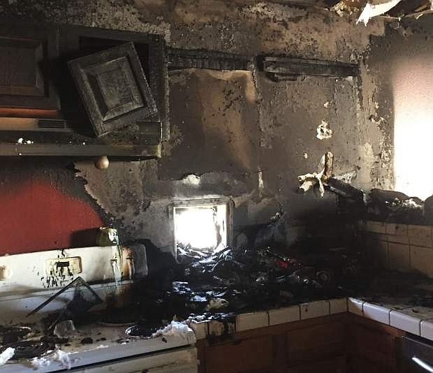 The kitchen of a home on Overlook Court following Saturday&#039;s fire.