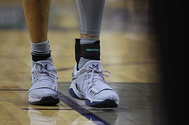 Caleb Martin&#039;s wore a brace on his injured foot Saturday against San Diego State.