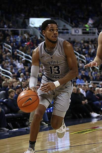 Nevada guard Hallice Cooke shown against San Diego State earlier this season. Cooke is one of three Pack seniors playing their final home game on Sunday.