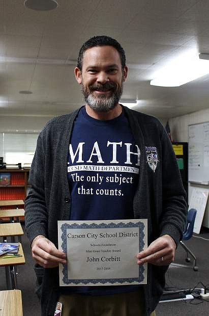 Pioneer High School teacher John Corbitt earned a mini-grant that will help fund a science rocketry program at the school.