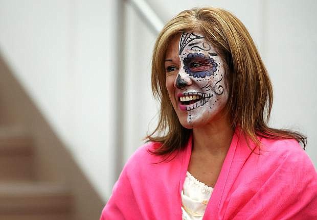 Lupe Ramirez, Latino Cohort Coordinator, participates in a Day of the Dead celebration at Western Nevada College.