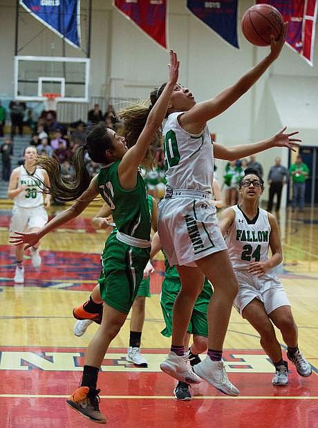 Fallon&#039;s Leilani Otuafi led both teams in scoring with 18 points as the Lady Wave advanced to the state championship game.