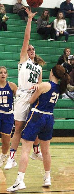 Fallon&#039;s Kaytlin Hunter leaps to sink a basket during the Lady Wave&#039;s first game against South Tahoe.