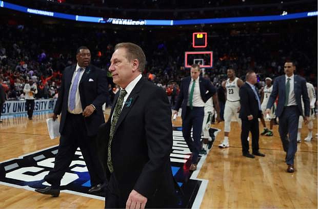 Michigan State head coach Tom Izzo walks off the court after the team lost to Syracuse in a second-round game in the NCAA college basketball tournament, Sunday, March 18, 2018, in Detroit. (AP Photo/Carlos Osorio)