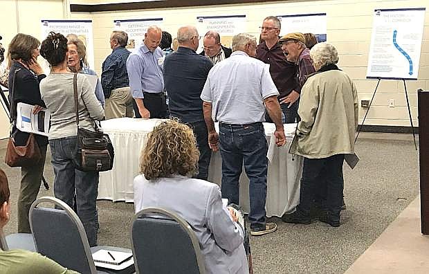 About 100 people attended a Nevada Department of Transportation public information meeting to discuss plans for the Interstate 11 corridor between Las Vegas and Reno.