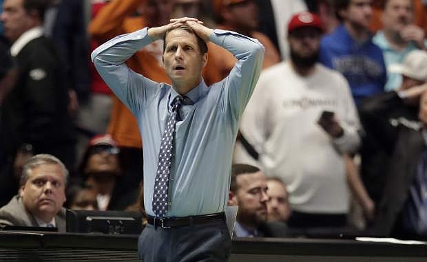 Nevada head coach Eric Musselman watches from the bench in the second half of a first-round game against Texas in the NCAA college basketball tournament in Nashville, Tenn., Friday, March 16, 2018. (AP Photo/Mark Humphrey)