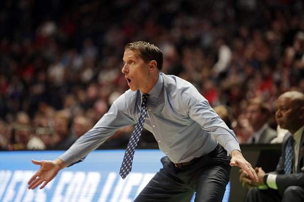 Nevada coach Eric Musselman reacts from the bench in the first half of Friday&#039;s game against Texas.