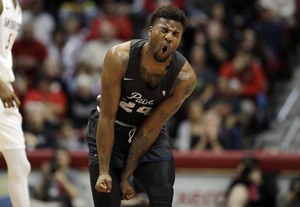 Nevada guard Jordan Caroline (24) reacts after turning over the ball during the second half of an NCAA college basketball game against San Diego State Saturday, March 3, 2018, in San Diego. (AP Photo/Gregory Bull)