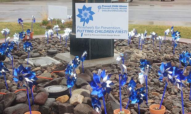 Pinwheels, each representing an investigation for child abuse, were planted in Fallon last week.