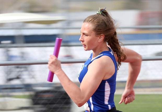 Annika Wick runs the final leg of the girls 4x200 relay race on Tuesday.