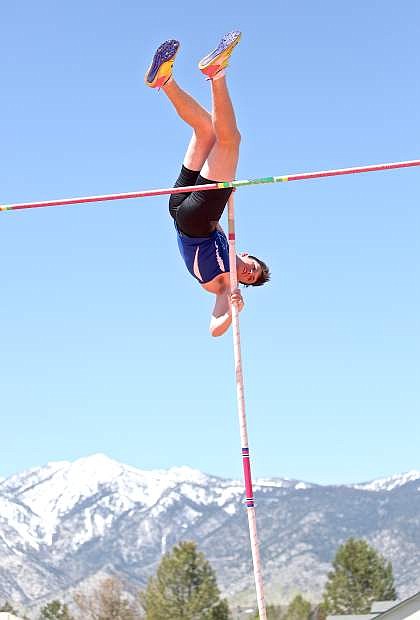 Senator Gabe Gabica clears the bar during the pole vault competition Saturday at the Big George Invitational at Douglas High.