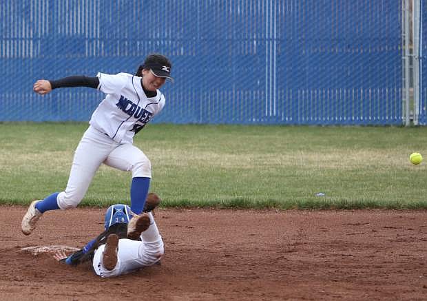 A Carson player safely slides into 2nd base Friday at CHS.