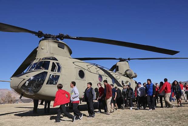 Eagle Valley Middle School students check out an Army National Guard helicopter that landed at the school in November.