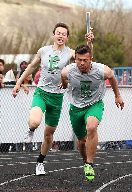Fallon senior Broder Thurston hands off the baton to junior Reid Clyburn in the 4x200 race at Reed last month.
