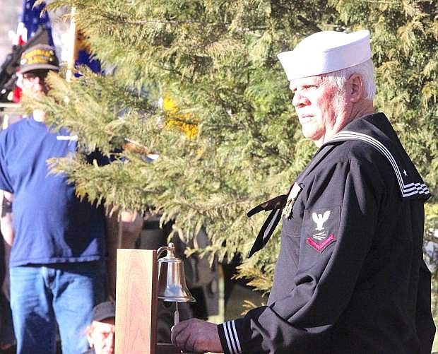 Navy veteran Don Bemis of Dayton rings a bell for every community that lost an individual during the Vietnam War.