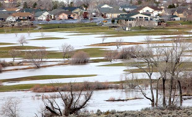 The Empire Ranch Golf Course is covered with standing water after a bad storm in January 2017.