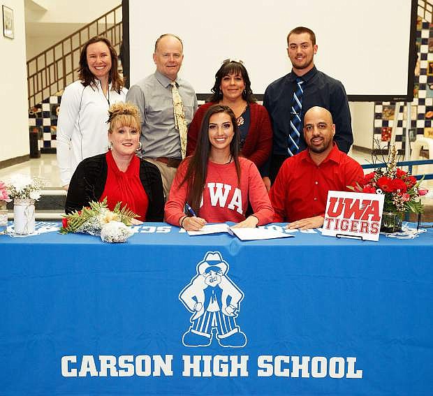 Carson High Senior Dajarrah Navarro signs her letter of intent to play volleyball at the University of West Alabama. She was joined by Coach Jordan Reeder, Coach Robert Maw, Monica Navarro, Gavin Meares and her parents Wendy and Trinity Navarro. Carson High School Senator Square, Carson City, Nevada