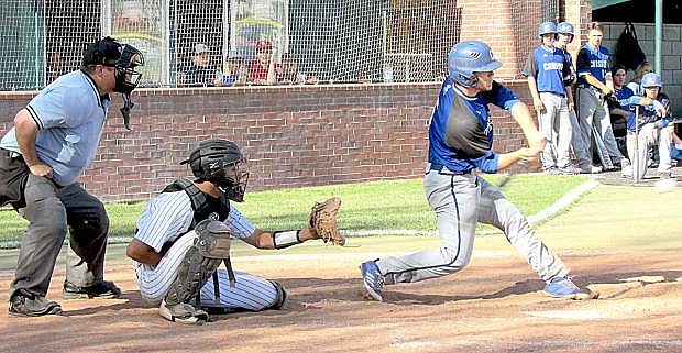 Carson&#039;s Abel Carter takes a swing during Thursday&#039;s game at Douglas High.