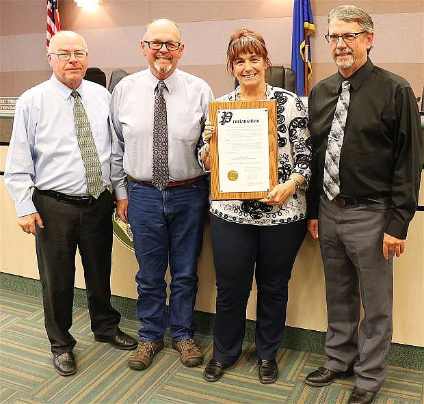 From left, Commissioners Bus Scharmann and Chair Pete Olsen; Andrea Zeller of Churchill County Coalition, and Commissioner Vice Chair Carl Erquiaga declare May 16 as Mental Health Awareness Day in Churchill County on Wednesday.