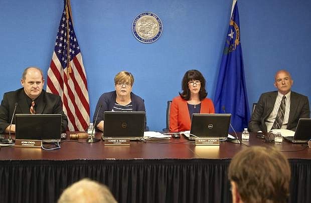 The panel of Nevada parole commissioners from left to right, Adam Endel, Connie Bisbee, Susan Jackson and Tony Corda listen to testimony from former NFL football star O.J. Simpson, who is appearing by video conference, during Simpson&#039;s parole hearing in Carson City, Nev., Thursday, July 20, 2017. Simpson was granted parole Thursday after more than eight years in prison for a Las Vegas hotel heist, successfully making his case in a nationally televised hearing that reflected America&#039;s enduring fascination with the former football star. (Brad Coman/Nevada Appeal via AP, Pool)