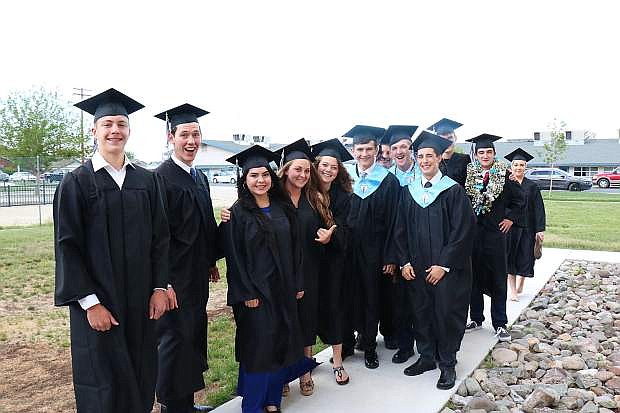 Class of 2018 at Oasis Academy have known each other since their early childhood years and graduated together as a group of 22 during the May 18 ceremony.