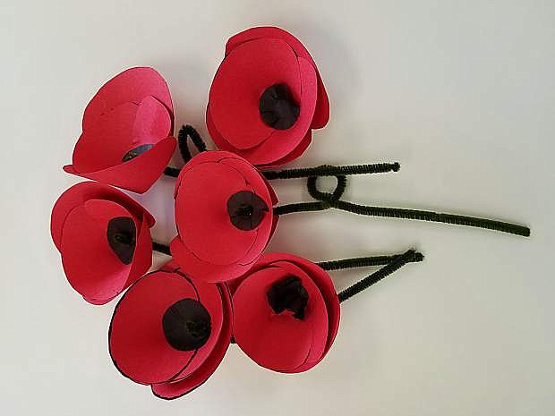 Visitors to the Nevada State Museum on Friday, May 25, can make paper poppies and learn the importance of poppies for remembrance from members of the American Legion Carson City unit.