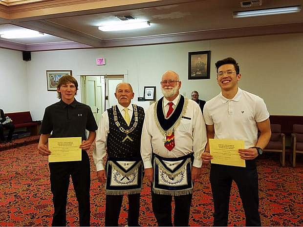 Pictured from left: Dakota Welch, Worshipal Master Dave Jones, Scholarship Committee member Michael Fuhlendorf and Christian Nemeth.